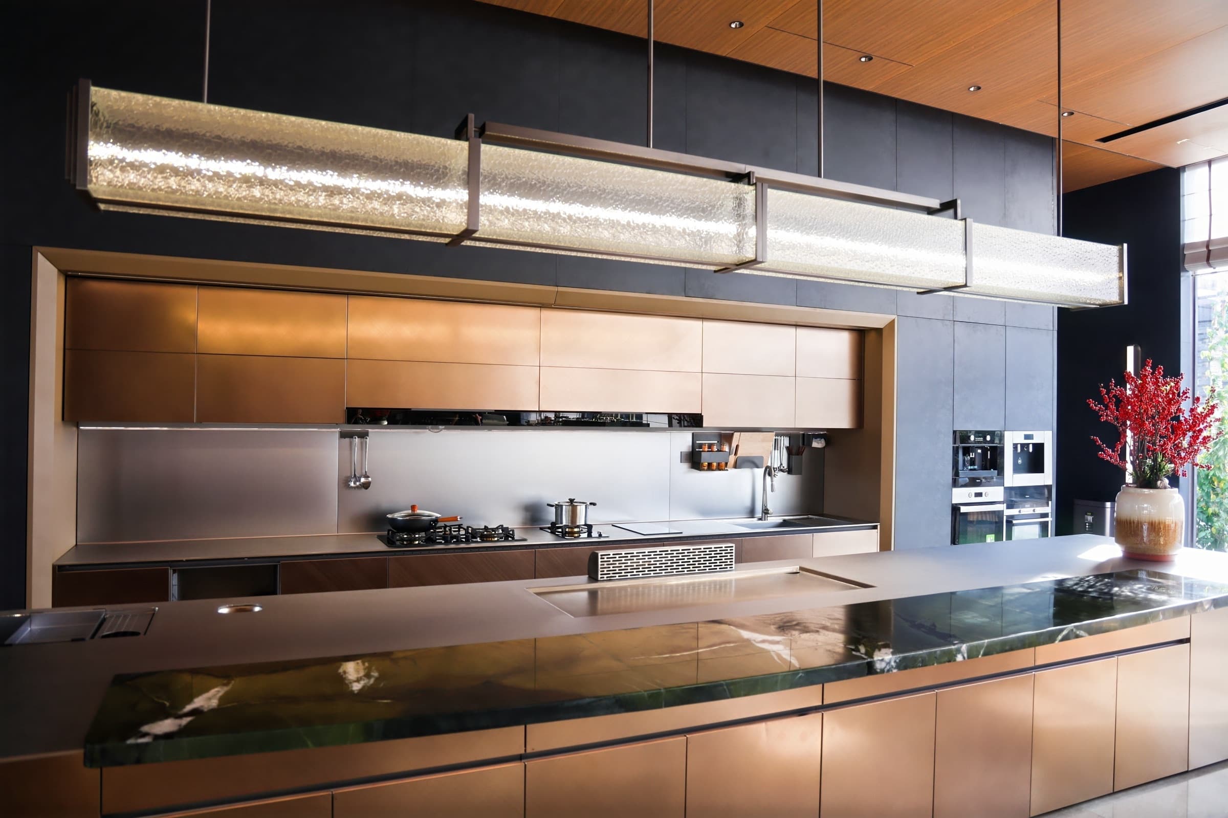 Material detail photograph focused on steel finish and shadow line.