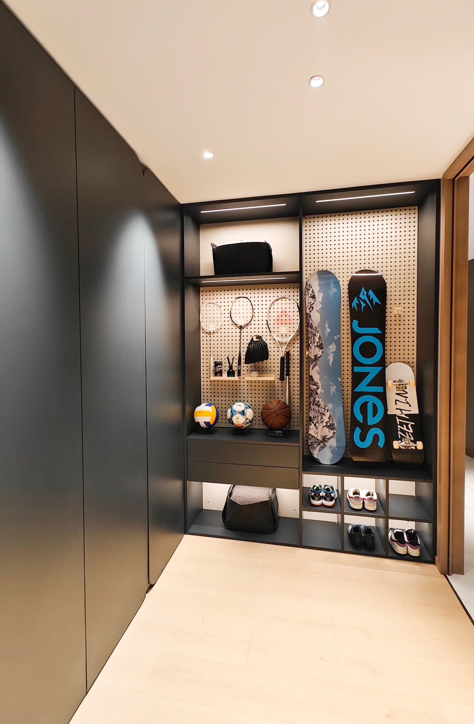 Architectural bath showroom view with controlled material palette.