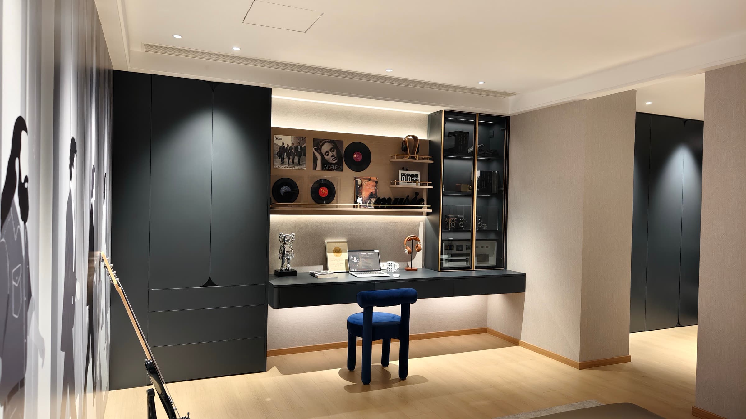 Wide bath and living transition vignette from the showroom.