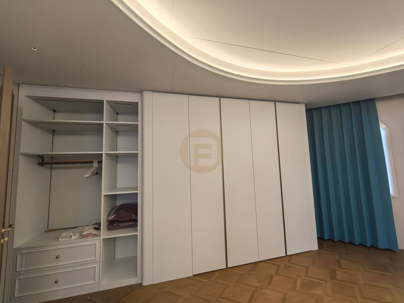 White storage cabinets with open hanging rods