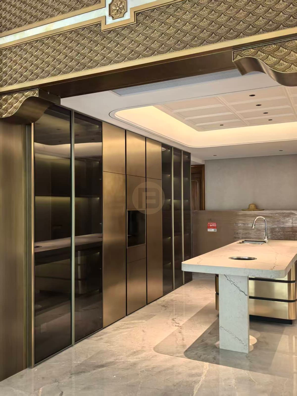 Kitchen cabinet wall viewed through the ornate entry opening