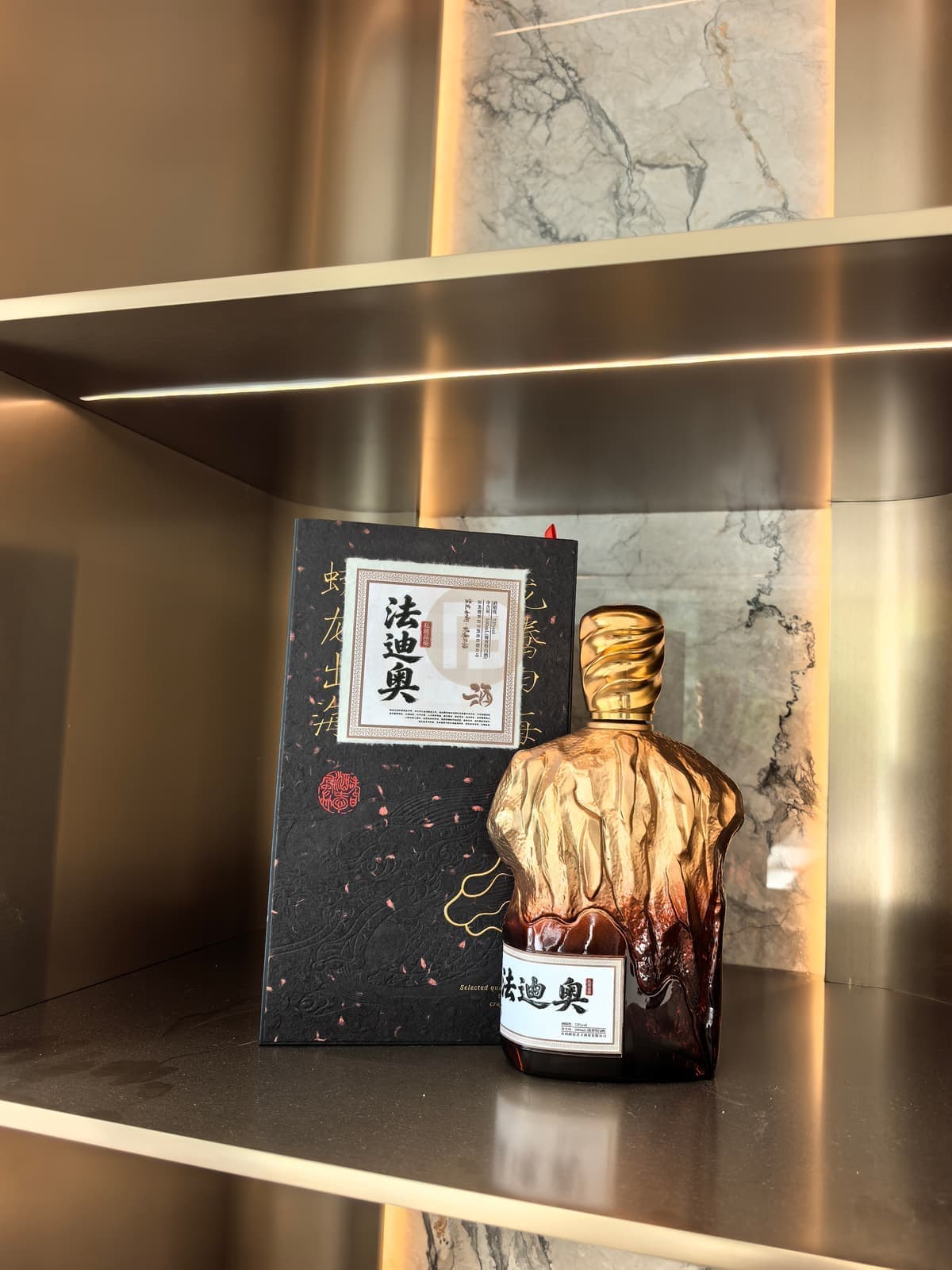 Fadior-branded display object inside the glass cabinet