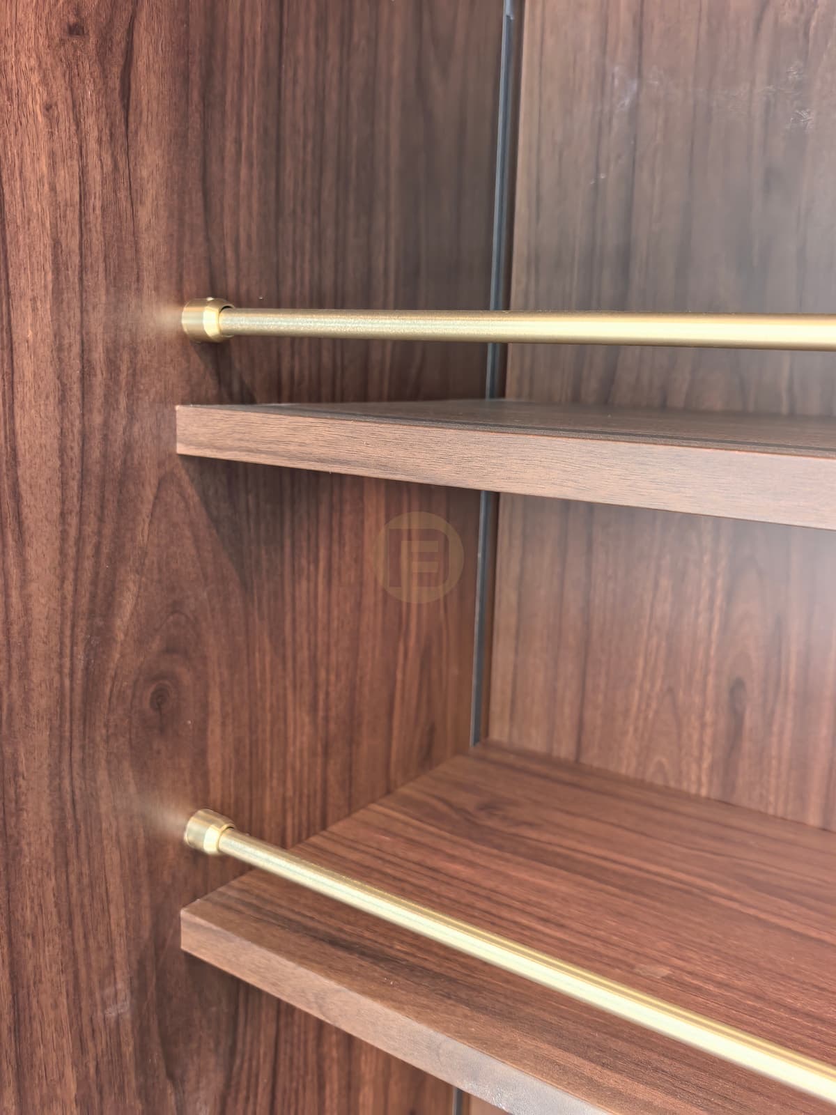 Wood-look display shelves with two metal-tone rails