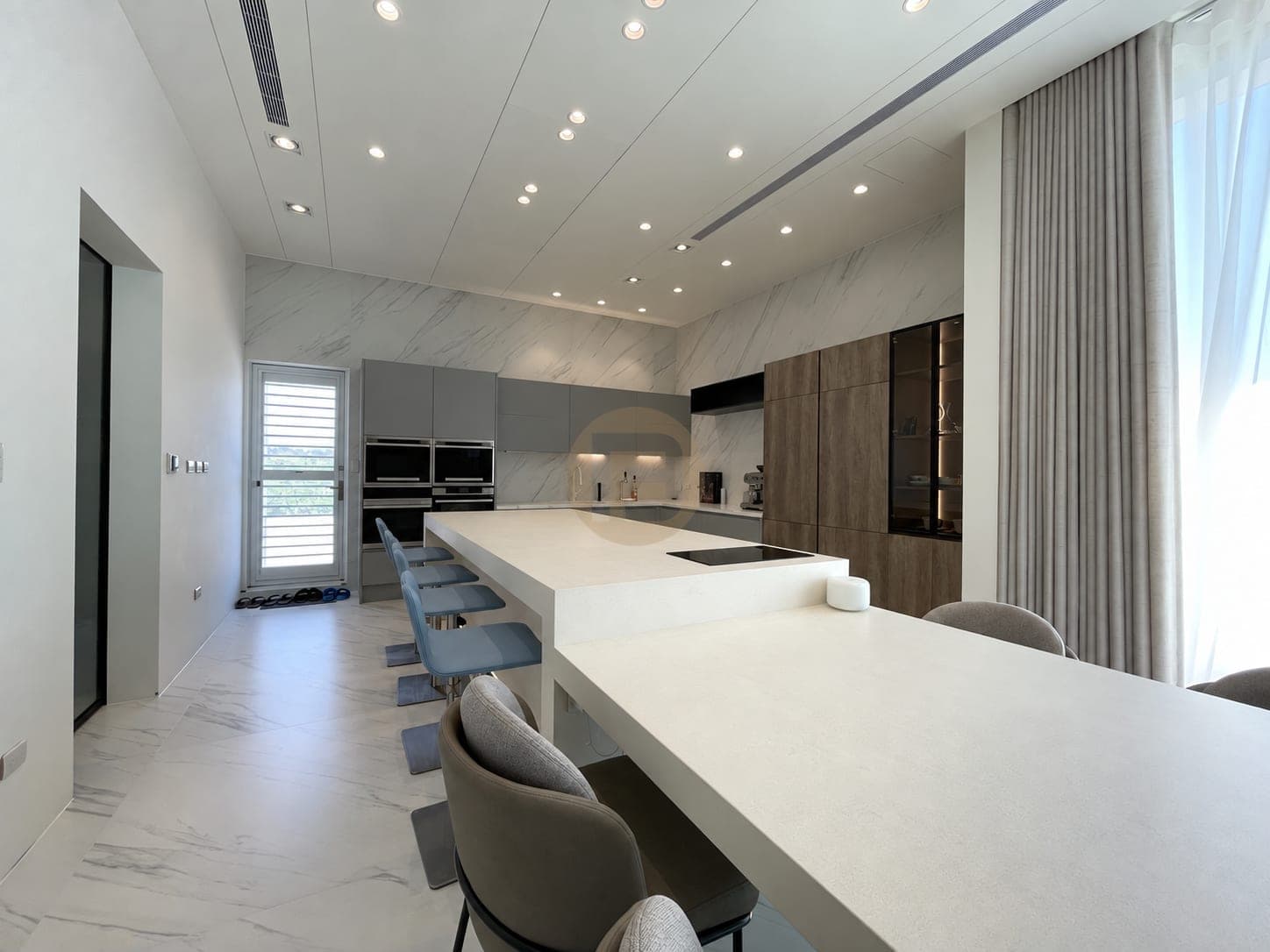 Open island kitchen facing the dining area